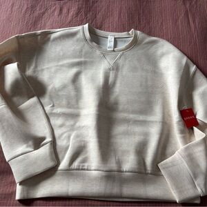 Air Essentials Crew Neck top